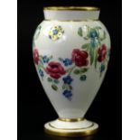 A McIntyre Florian type ware small vase, with tube lined decoration of swags of blue and red