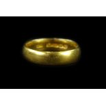 A 22ct gold wedding band, of plain design, makers stamp WM, ring size P½, 6.2g.