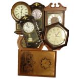 A quantity of wall clocks, to include a Genalex, example in associated case etc.Provenance: This