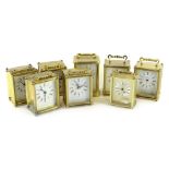 A quantity of battery operated carriage clocks, mainly with a shaped case by Smiths and a Timemaster