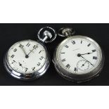A silver pocket watch with engine turned case, the enamel dial stamped Waltham and a Smiths plated