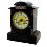 A French black slate and marble mantel clock, with a domed top, the enamel type dial with Roman