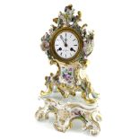 A 19thC French porcelain mantel clock, the case painted with flowers and with flower encrusted