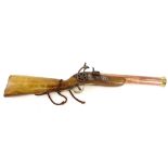 A novelty mahogany brass and copper replica blunderbuss rifle, 76cm L.
