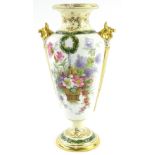 A Spode Copeland porcelain two handled vase, painted with a basket of flowers, reads etc.,