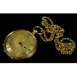 A fob watch and chain, the fob watch with circular design yellow metal watch head, with engraved