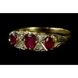 A 9ct gold dress ring, set with garnet and imitation diamonds, in gypsy style, with claw settings,