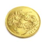 A George V 1913 full gold sovereign.