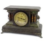 A late 19thC American ebonised mantel clock, in the French style with gilt metal mounts, 29cm L.