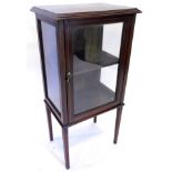 An Edwardian mahogany and checker banded display cabinet, with a single glazed doors, on square