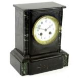 A French black slate mantel clock, the white enamel dial with Arabic numerals, 25cm H.Provenance: