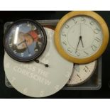A large quantity of battery operated novelty wall clocks, various styles, designs etc.Provenance: