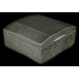 A George V small silver cigarette box, with engine turned decoration and cedar interior,