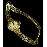 A 9ct gold Rotary ladies wristwatch, with oval watch head and 21 jewel movement, with three row
