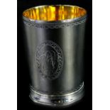 A George III silver beaker, with a gilt interior, engraved with monogram with an oval, London