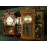 Five various wall clocks, to include two 1920's oak examples with Arabic numerals.Provenance: This