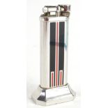 A Dunhill cigarette lighter, with Art Deco style enamel decoration in black and red, stamped 28322.