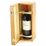 A bottle of Fortnum and Mason 1996 St Emilion wine, with presentation case.