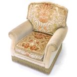 A mid to late 20thC child's armchair, upholstered in floral dralon etc.The upholstery in this lot