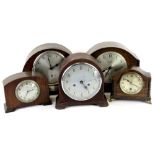 A collection of five mantel clocks and timepieces, to include a brown Bakelite cased piece, a