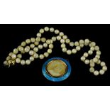 Two items of jewellery, to include a faux pearl necklace with 9ct gold clasp (AF), and a silver