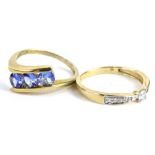 Two 9ct gold dress rings, to include one set with purple/blue stones and another set with CZ stones,