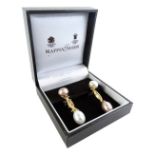 A pair of 18ct gold South Sea pearl set drop earrings, the top pink coloured pearl, set in white
