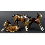 Three Beswick brown foals, the tallest 13cm H. (AF)