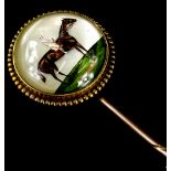 An Essex crystal stick pin, with circular pin head depicting a figure on horseback, 2cm dia, with