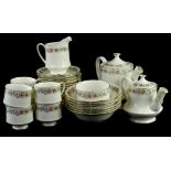 A Royal Albert Belinda pattern part tea service, to include two teapots, cups etc.