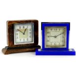Two Art Deco mantel timepieces, one in chrome plated and blue glass case, the other similar in a