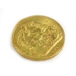 A George V 1913 full gold sovereign.