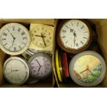 A large quantity of battery operated wall clocks, various designs and styles.Provenance: This