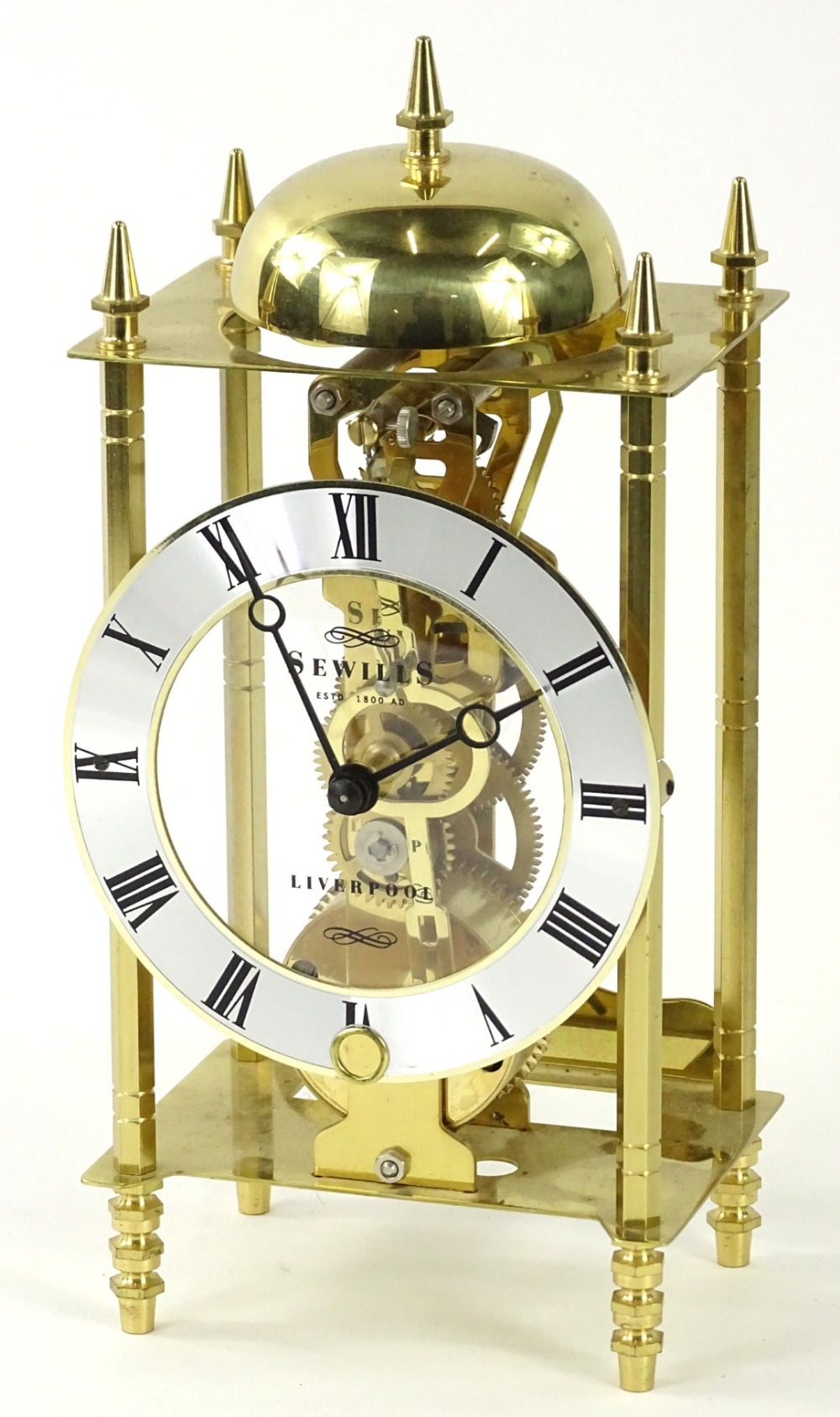 A Sewills of Liverpool brass skeleton clock, the silvered dial 23cm H.