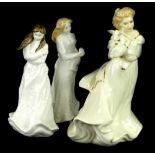 Three Royal Doulton ceramic figurines, Lambing Time, Many Happy Returns and Embrace.