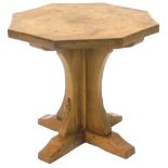 A Robert Thompson of Kilburn Mouseman oak coffee table, with an octagonal top, on concave support