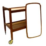 A 1970s teak two tier trolley, possibly Danish and a rectangular wall mirror.
