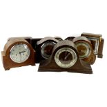 A collection of mainly oak cased mantel clocks and timepieces, to include some Art Deco examples,