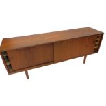 A Danish retro teak sideboard, with sliding doors, on tapering legs, 200cm W.