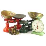 Three sets of weighing scales, to include two with brass pans etc. and some brass bell weights.