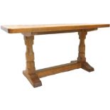 A Robert Thompson of Kilburn Mouseman rectangular oak coffee table, on octagonal chamfered