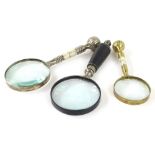 Three decorative magnifying glasses, to include one in silver plate etc.