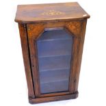 A Victorian walnut and marquetry music cabinet, the glazed door enclosing various named shelves on
