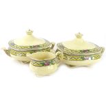 A pair of Wedgwood Evesham pattern two handled tureens and covers and a milk jug.