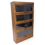 An oak solicitor's type bookcase, with two hinged glazed doors, in the manner of Globe Wernicke,