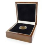 A 1932 South African gold sovereign, in fitted case with certificate.