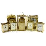 A quantity of brass and brass effect battery operated carriage clocks, to include Minister, Swiza