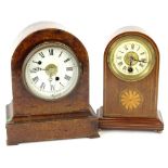 A mantel clock and a mantel timepiece, one in arched walnut case, the other mahogany with