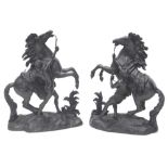 A pair of 19thC Continental spelter Marley horses, each on a naturalistic base, 50cm H.