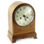 An early 20thC mahogany and burr yew mantel clock, the silvered dial with Roman numerals, 30cm H.